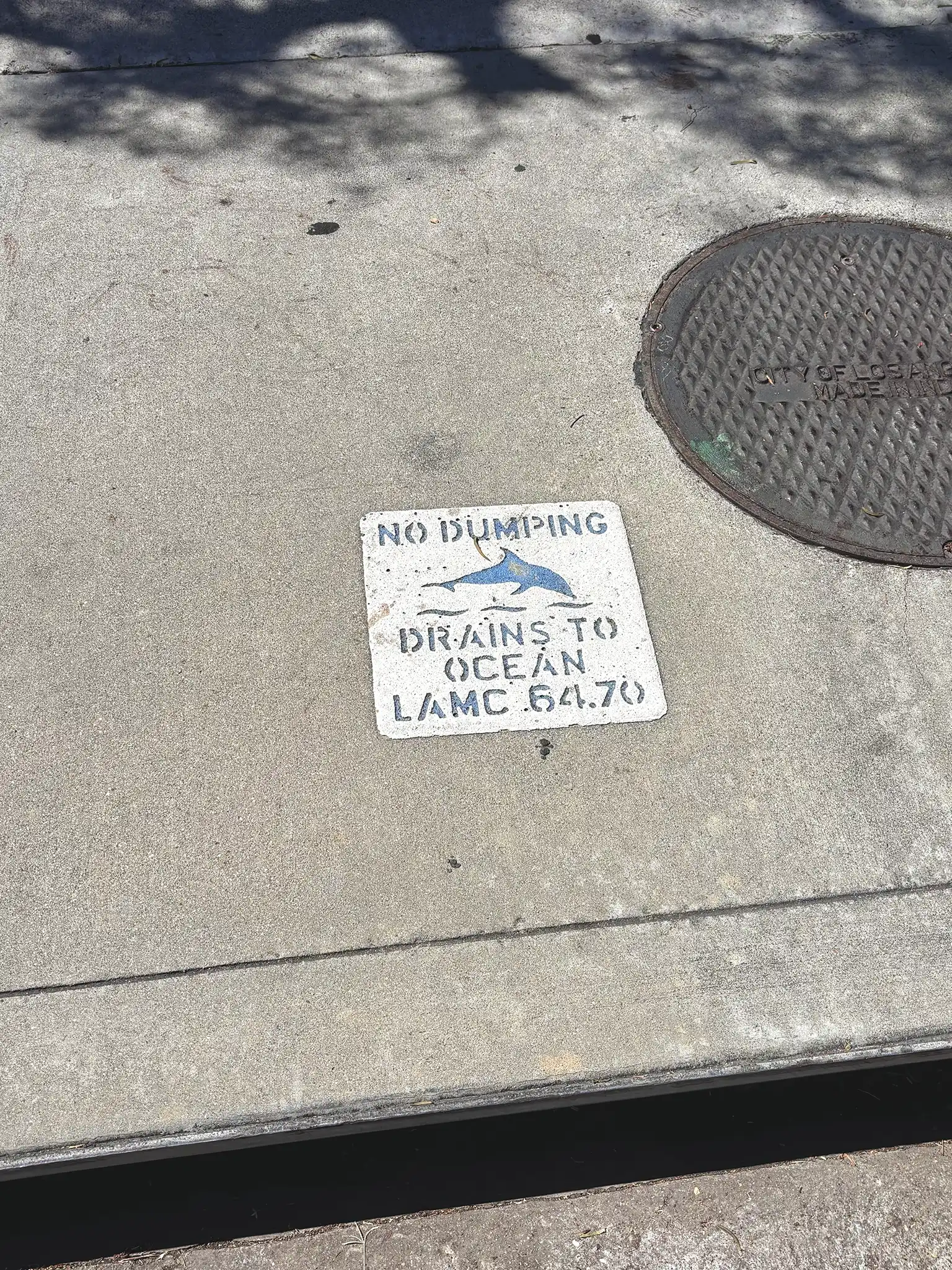 Santa Monica 'No Dumping' thermoplastic signs<br>Oscar Amaro, 1992